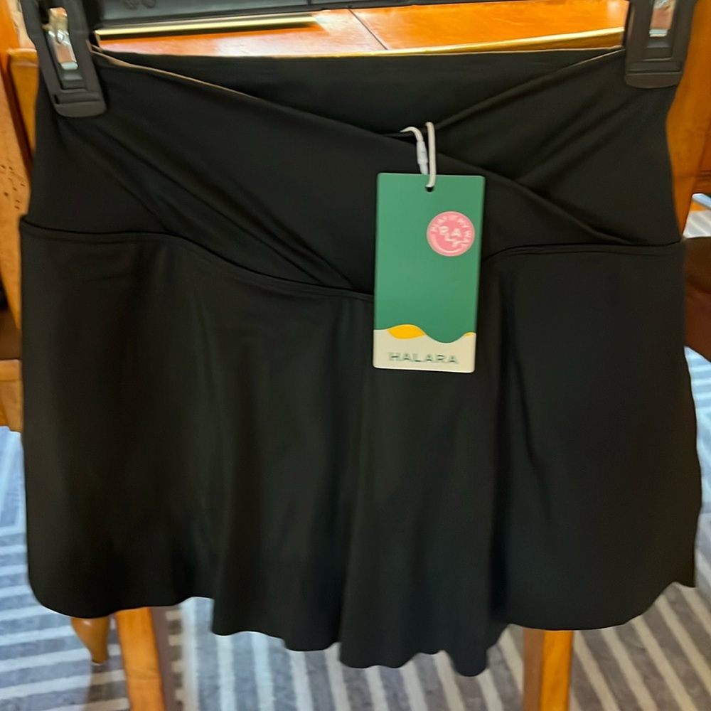 HALARA crossover side pocket skirt
